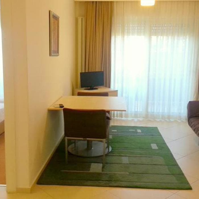 Kamer Suites & Hotel